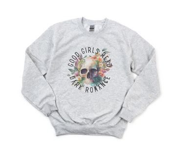 Gray sweatshirt with skull and floral design and text on a white background