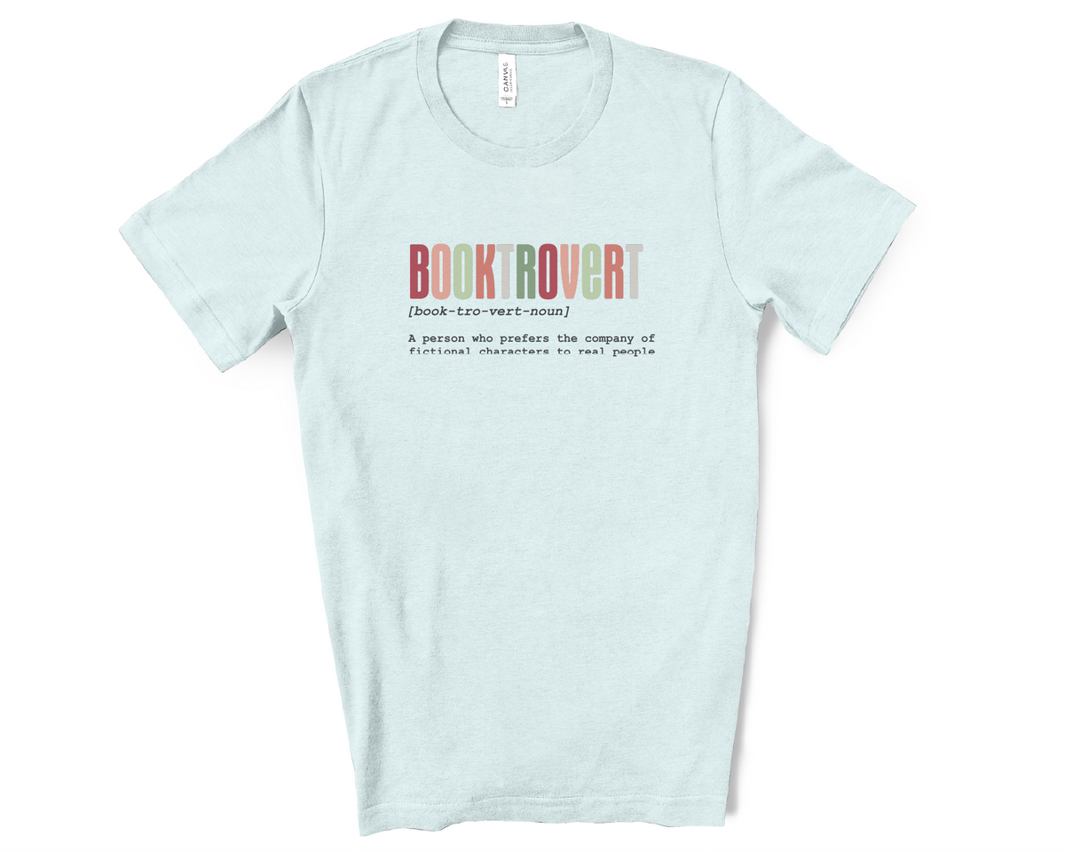 Light blue t-shirt with colorful text design on a white background