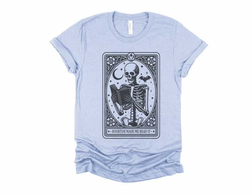 Light blue t-shirt with a skeleton design and text on a white background