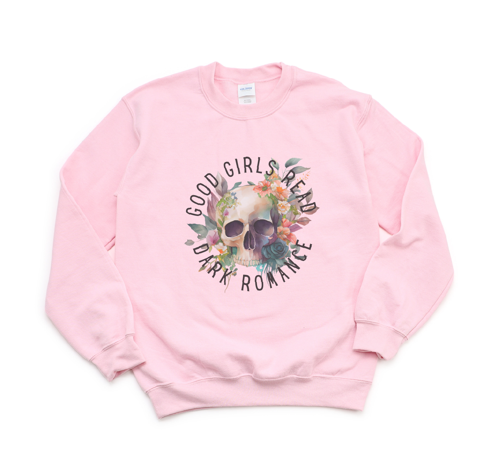 Pink sweatshirt with skull and floral design on a white background
