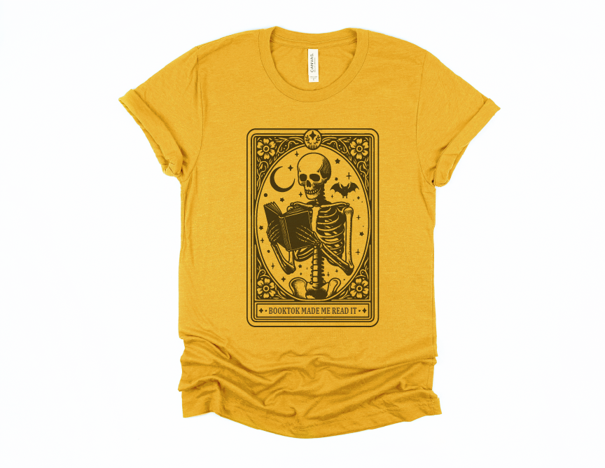 Yellow t-shirt with a skeleton design and text on a white background
