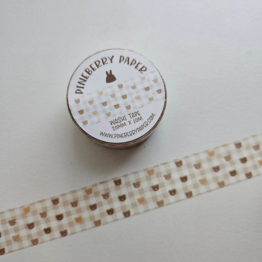Spool of Pineberry Paper washi tape with a pattern on a white background